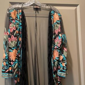 Shyanne.   Sheer duster with fringe and embroidery
